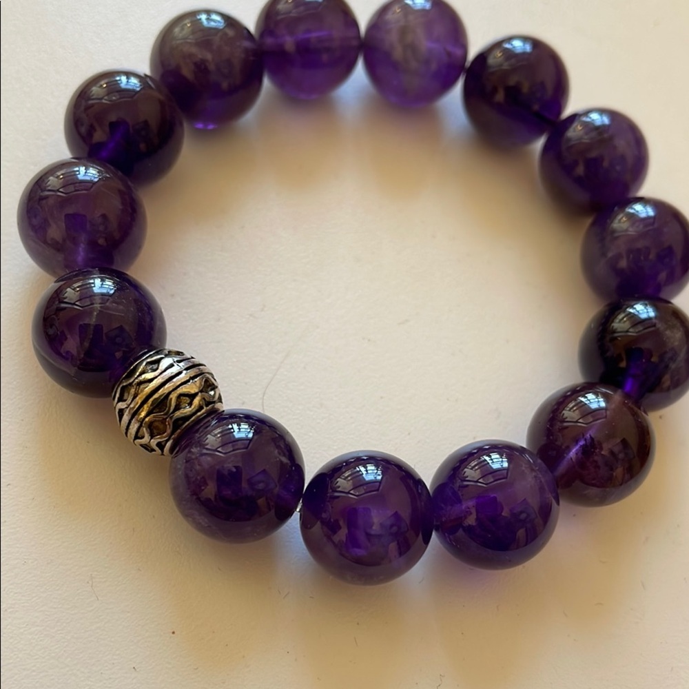 Amethyst Stretch Bracelet with Silver Detail.
